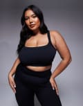 [ASOS] 4505 Curve seamless sculpting medium support sports bra in black XL Black