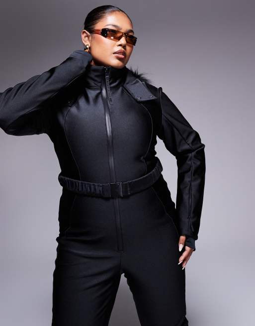 ASOS 4505 Curve belted ski suit with slim kick leg and faux fur hood in black gloss