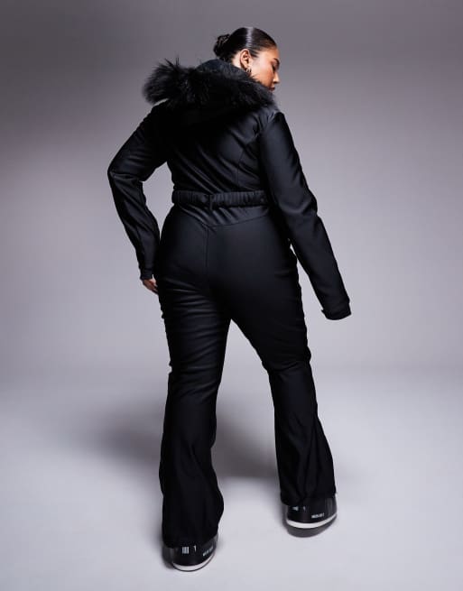 ASOS 4505 Curve belted ski suit with slim kick leg and faux fur hood in black gloss