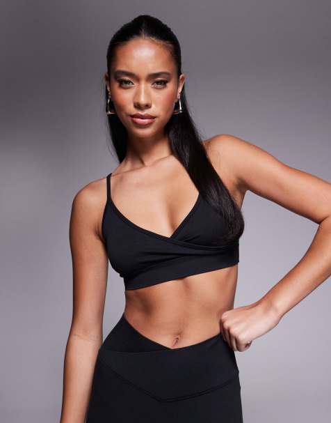 4505 wrap front seamless light support sports bra in black 