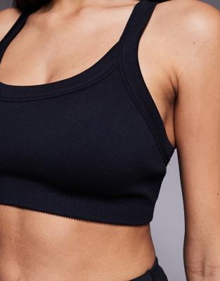 4505 Fuller Bust Seamless Sculpting Medium Support Sports Bra With Adjustable Straps In Black