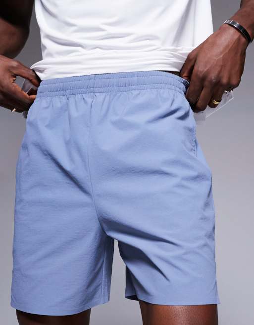 4505 - Gråblå løbeshorts med telefonlomme bagpå i ripstop-nylon på 13 cm, 3 af 5