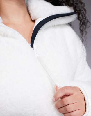 ASOS 4505 Hourglass Ski suit with faux fur panels and skinny leg in black and white