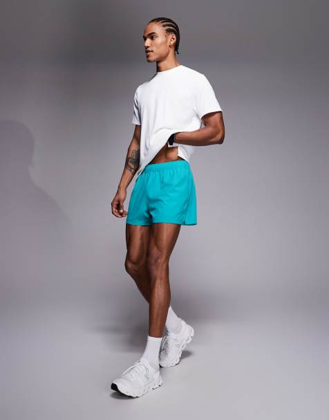 4505 Icon 3 inch quick dry running shorts with back phone pocket in bright turquoise - view 1