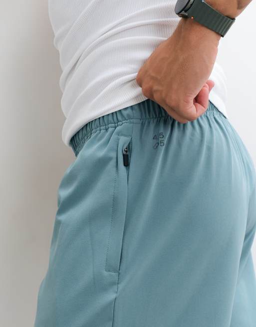 4505 Icon 5 inch quick dry training shorts with zip pockets in oil blue, 4 of 5