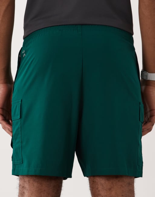 4505 Icon 7-inch quick dry training cargo shorts with zip pockets in bottle green, 5 of 5