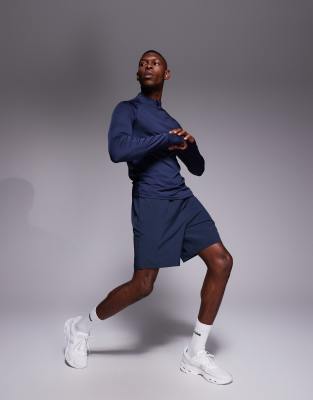 4505 Icon 7 Inch Quick Dry Training Shorts With Zip Pockets In Blue
