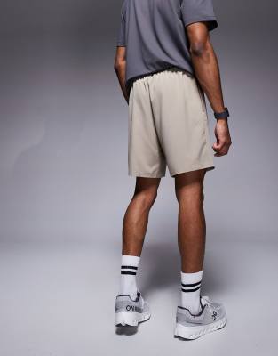 4505 Icon 7-inch Quick Dry Training Shorts With Zip Pockets In Neutral