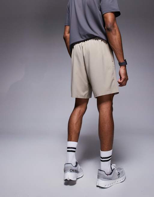 4505 Icon 7 inch quick dry training shorts with zip pockets in stone, 2 of 5