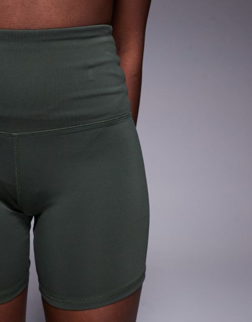 4505 Icon active high waist 5 inch legging short with zip phone pocket in dark green , 4 of 5