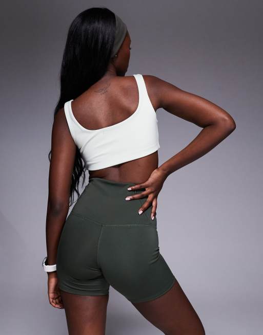 4505 Icon active high waist 5 inch legging short with zip phone pocket in dark green , 5 of 5
