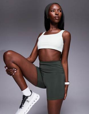4505 Icon active high waist 5 inch legging shorts with zip phone pocket in dark green