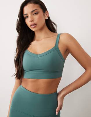4505 Icon active medium support sports bra with removable padding and adjustable straps in sage-Green