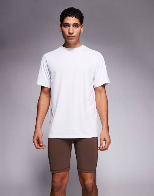 4505 Icon active quick dry base layer training half tight with phone pocket in brown, 2 of 5