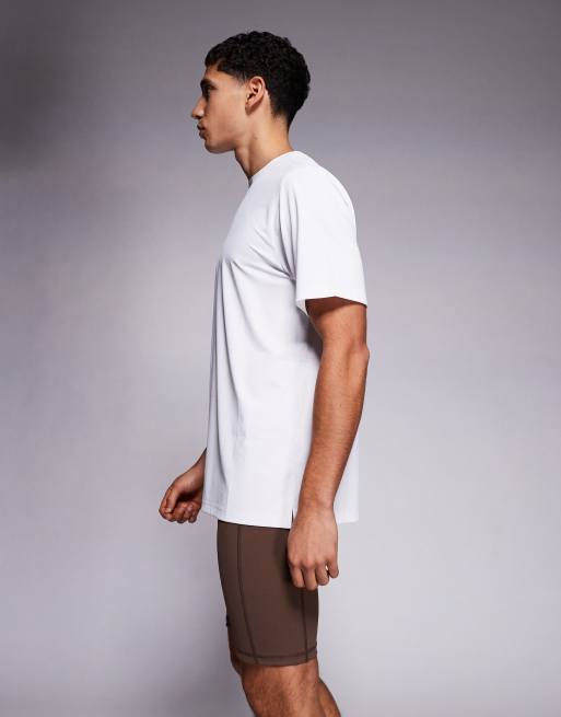 4505 Icon active quick dry base layer training half tight with phone pocket in brown, 3 of 5