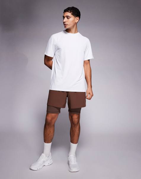 4505 Icon active quick dry base layer training half tights with phone pocket in brown - view 1