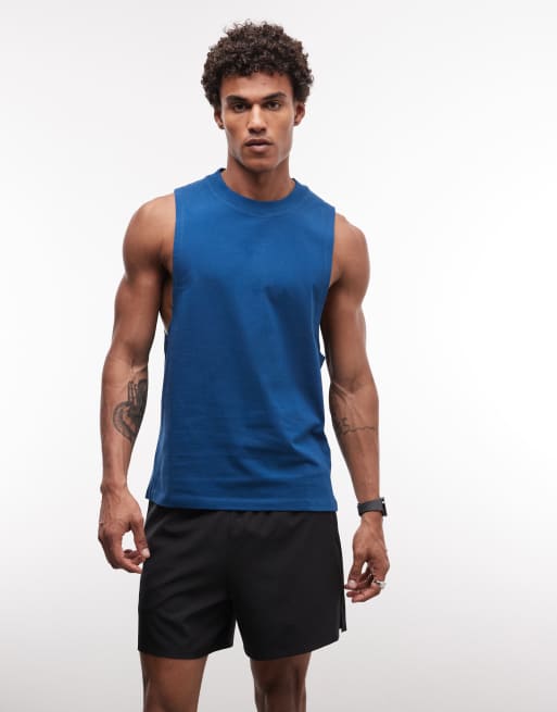 4505 - Icon - Camiseta deportiva azul intenso sin mangas con sisas caídas y acabado de secado rápido de algodón, 4 de 5
