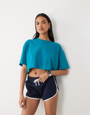 Icon - Cropped-T-Shirt aus schwerer Baumwolle in verwaschenem Cerulean mit schnelltrocknendem Finish-Blau Blau 40