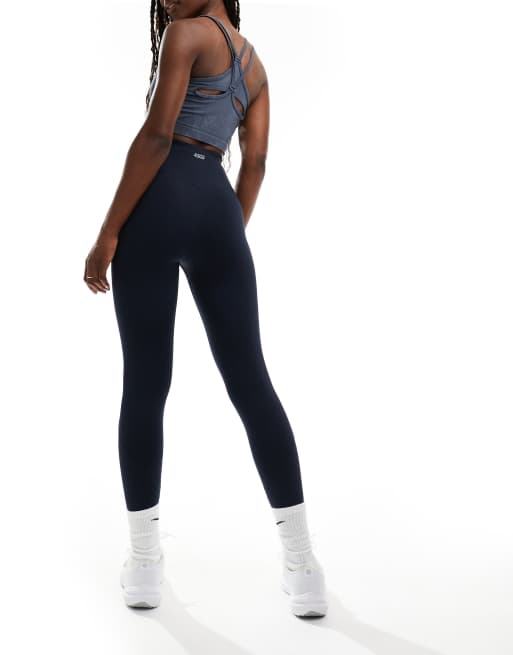 4505 - Icon - Fitnesslegging met vormgevende achterkant en logo in marineblauw 