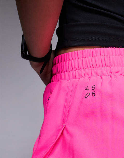 4505 - Icon - Geweven hardloopshort met icoonlogo en zakken met rits in felroze, 5 van 5