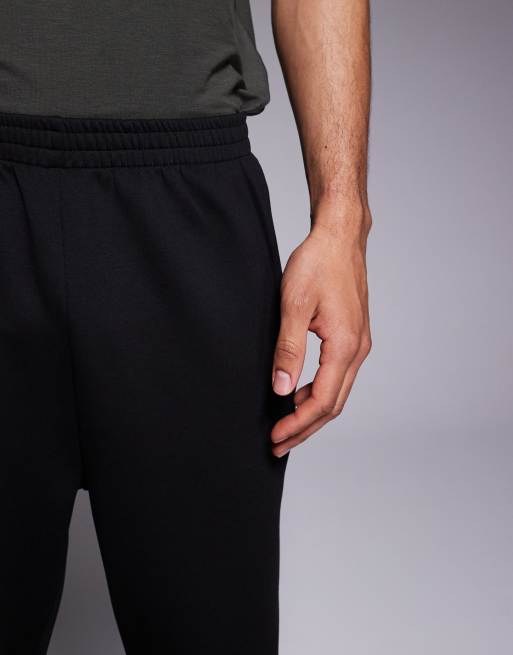 4505 - Icon - Joggers tecnici affusolati quick dry neri , 4 di 5