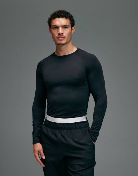 4505 – Icon – Langärmliges, körperbetontes, schnelltrocknendes Sport-Baselayer-Oberteil in Schwarz - view 1