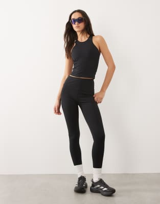Icon - Legging de sport avec taille nouée et poche pour téléphone - Noir 40