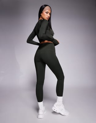 Icon - Legging de sport effet sculptant à l'arrière avec poche intérieure - Kaki foncé-Vert 34