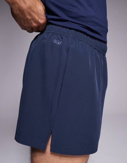 4505 - Icon - Mørk marineblå hurtigttørrende 8-cm-løbeshorts med telefonlomme bagpå, 5 af 5