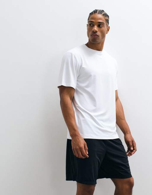 4505 - Icon - Pakke med 2 trænings-T-shirts i hurtigttørrende mesh i sort/hvid, 4 af 5