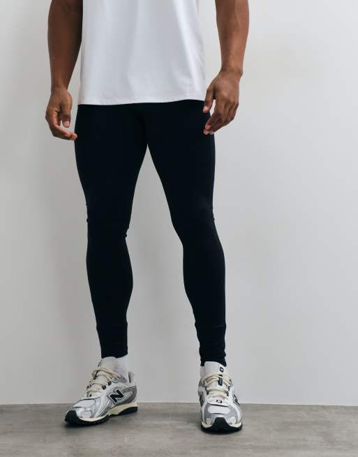 4505 – Icon – Schnelltrocknende Baselayer-Sportleggings in Schwarz mit Handytasche , 2 von 5