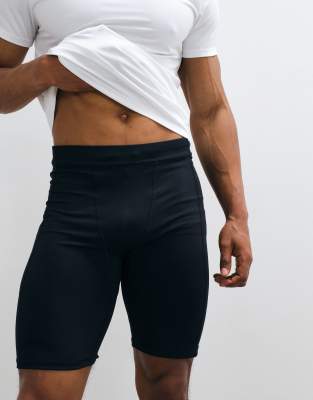 Icon - Schnelltrocknende, halblange Baselayer-Sportleggings in Schwarz mit Handytasche Schwarz XS