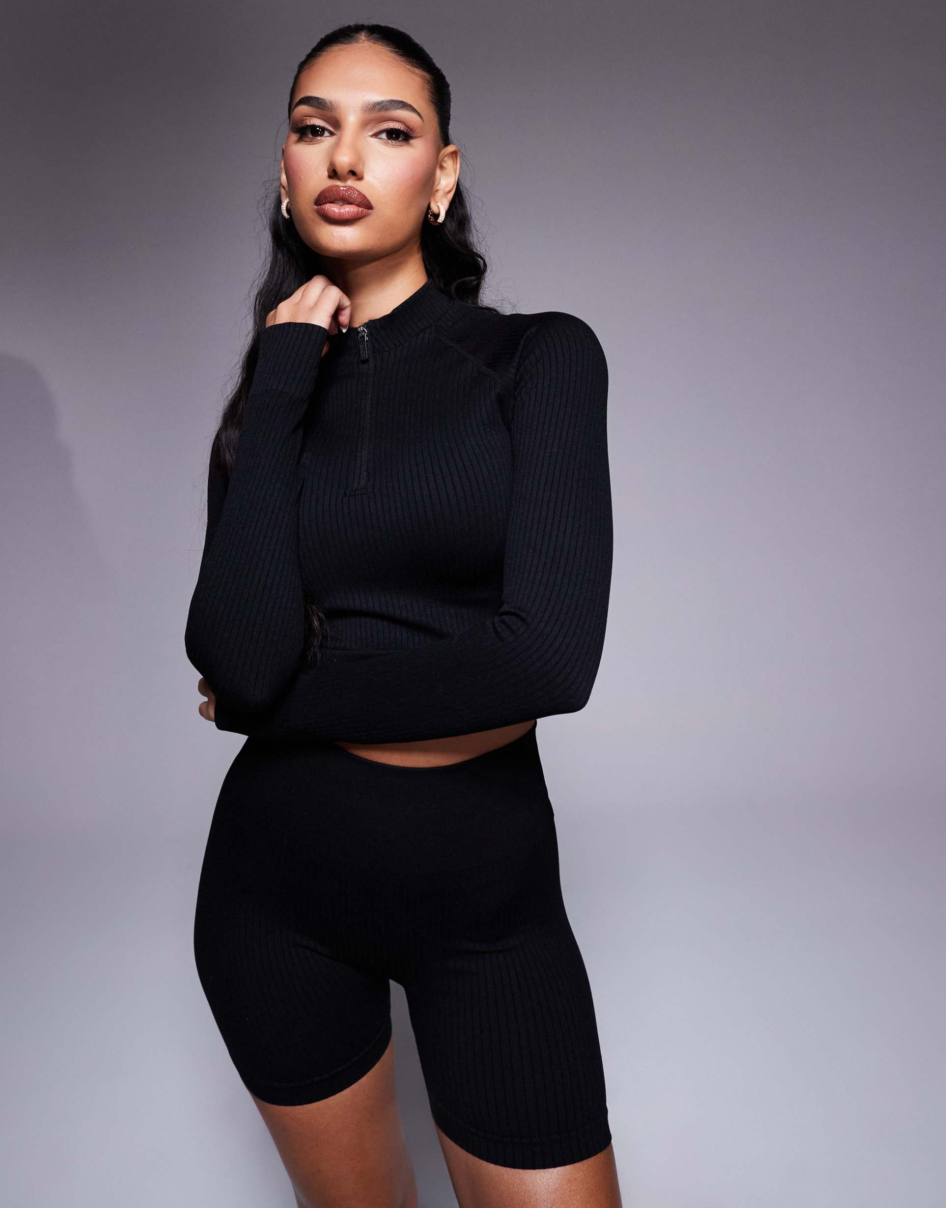 4505 icon seamless rib knit 1/4 zip long sleeve top in black