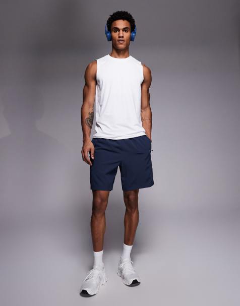 4505 Icon - Sneldrogende trainingsshort van 7" met ritszakken in marineblauw - view 1