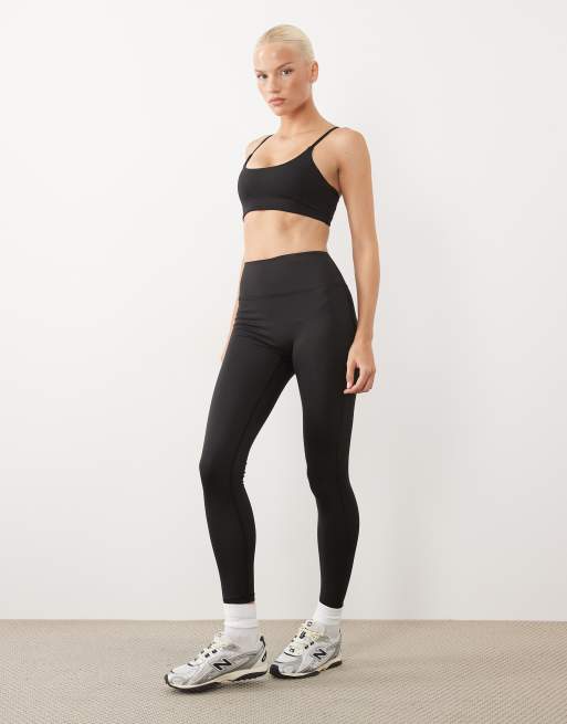 4505 Icon soft-touch scoop neck light support sports bra with adjustable straps in black, 2 of 4