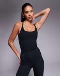[ASOS] 4505 Icon soft touch yoga cami with inner bra and adjustable straps in black 14 Black