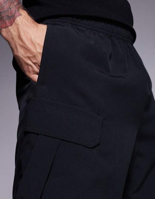 4505 – Icon – Svarta träningsshorts i snabbtorkande material med cargostil, 18cm, 5 av 5