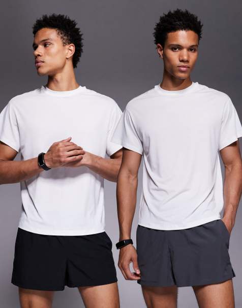 4505 – Icon – Zestaw 2 par szybkoschnących szortów do biegania w kolorze czarnym i grafitowym o długości 8 cm z kieszenią na telefon na plecach - view 1