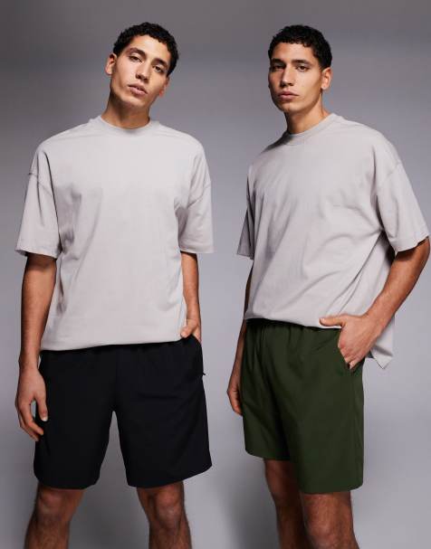 4505 – Icon – Zestaw 2 par szybkoschnących szortów sportowych o długości 18 cm z kieszeniami zapinanymi na zamek w kolorach czarnym i khaki - view 1