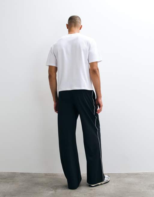4505 jogger tissé avec bande latérale et poches zippées en noir, 3 de 5