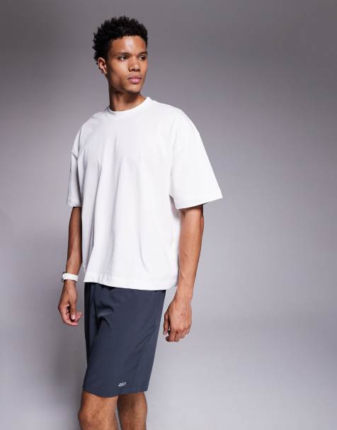 4505 – Kastiges Sport-T-Shirt in Cropped-Passform aus schwerer, schnell trocknender Baumwolle in Weiß - view 1