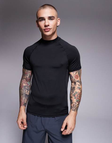 4505 – Körperbetontes Baselayer-T-Shirt aus schnell trocknendem Material in Schwarz mit Ziernaht und Stehkragen - view 1