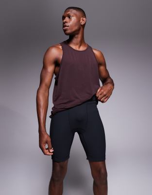 Kurze gerippte Baselayer-Leggings in Schwarz mit Handytasche Schwarz XS