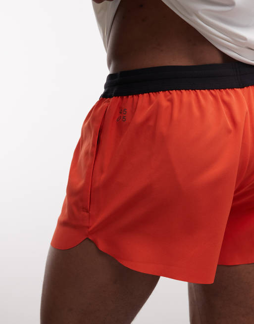 4505 – Lauf-Shorts in Tomatenrot mit elastischem Bund und Reißverschlusstaschen, 5 cm Schrittlänge, 4 von 5