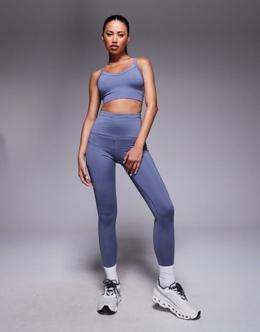 4505 - Leggings da corsa a vita alta color fiordaliso con tasca per il telefono con zip