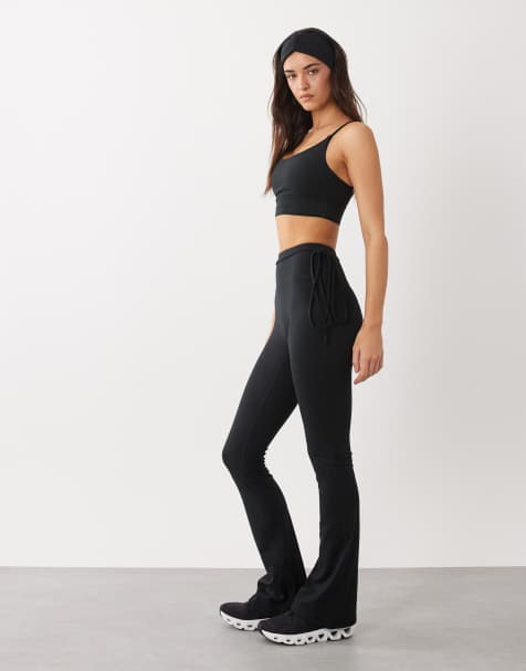4505 - Leggings negros acampanados para yoga con detalle de lazada en la cintura de tejido suave - view 1