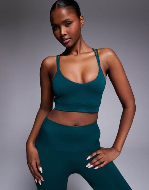 4505 - Mørk blågrøn sømløs sports-BH med medium støtte, flere stropper og udtagelig polstring