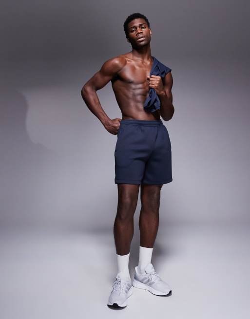 4505 - Mørk marineblå joggingshorts i hurtigttørrende performance-materiale på 18 cm