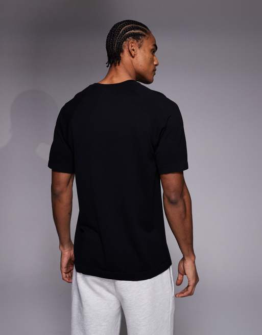 4505 - Naadloos, sneldrogend, losvallend hardloop-T-shirt van lichtgewicht mesh in zwart, 3 van 5