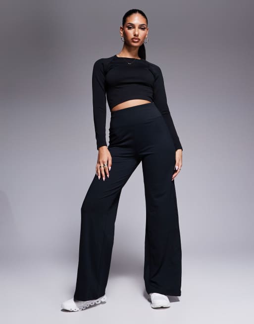 4505 - Naadloze cropped top met lange mouwen in zwart , 3 van 4